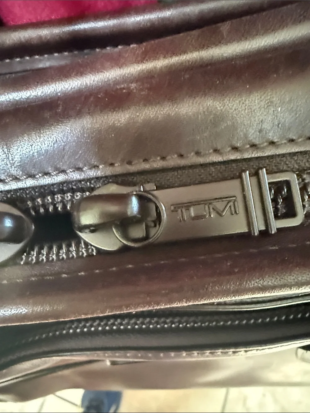 Tumi alpha leather